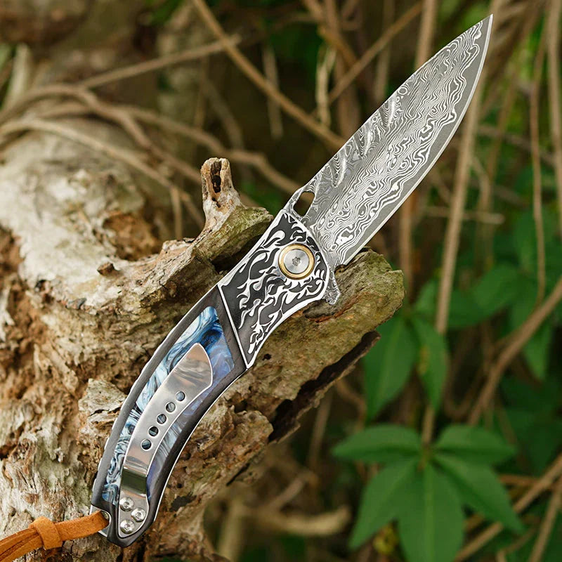 7" Handmade Damascus Pocket Knife with Pocket Clip - Resin & Ebony Wood - Flame Carved Steel Head Bolster